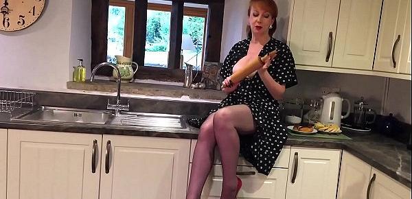 Red XXX fucks the rolling pin in the kitchen